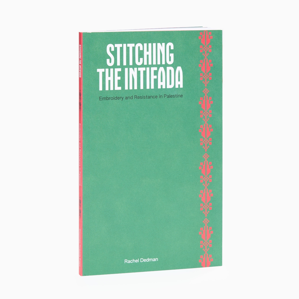 A green book with the title "Stitching the intifada"
