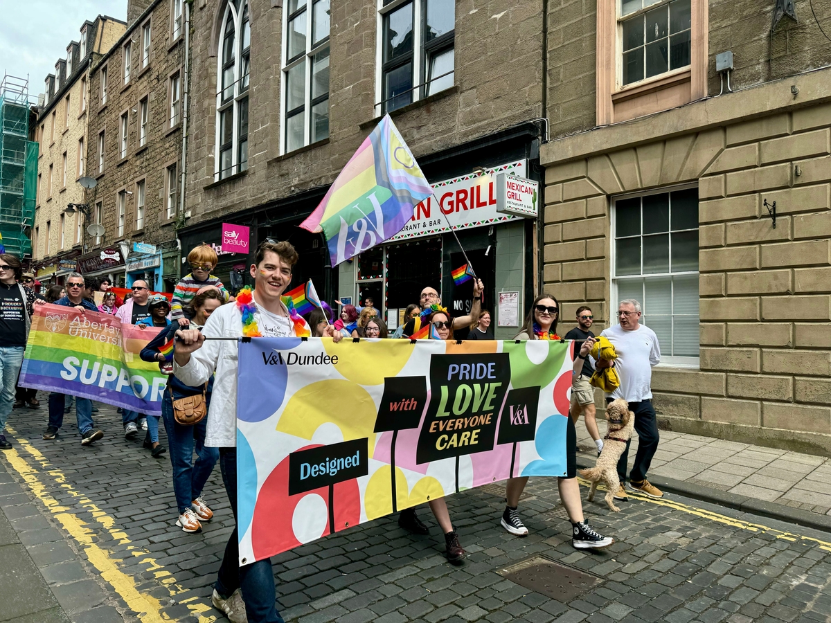 A march of people celebrating Dundee Pride 2024.