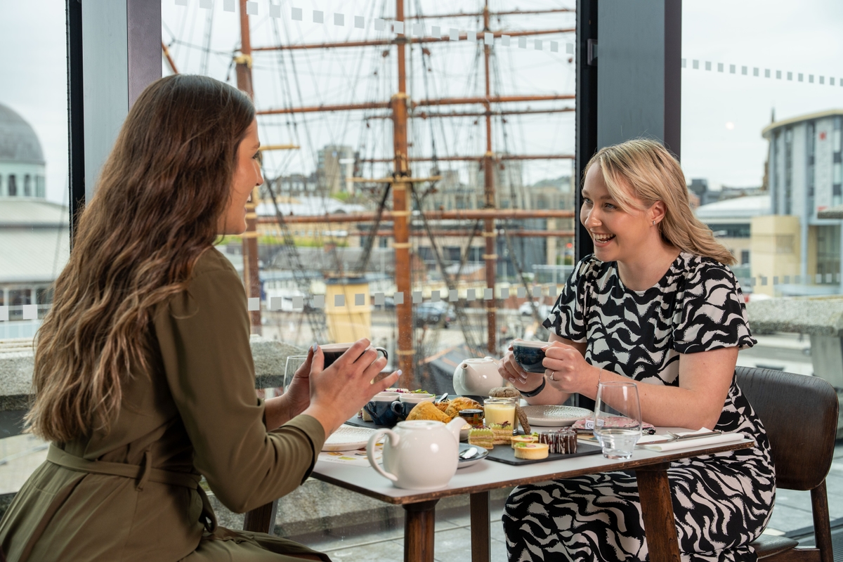Two people enjoying our Kimono afternoon tea