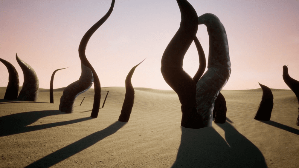 Abstract twisted sculptures emerge from a sandy desert under a pink, dawn-lit sky, casting long shadows.