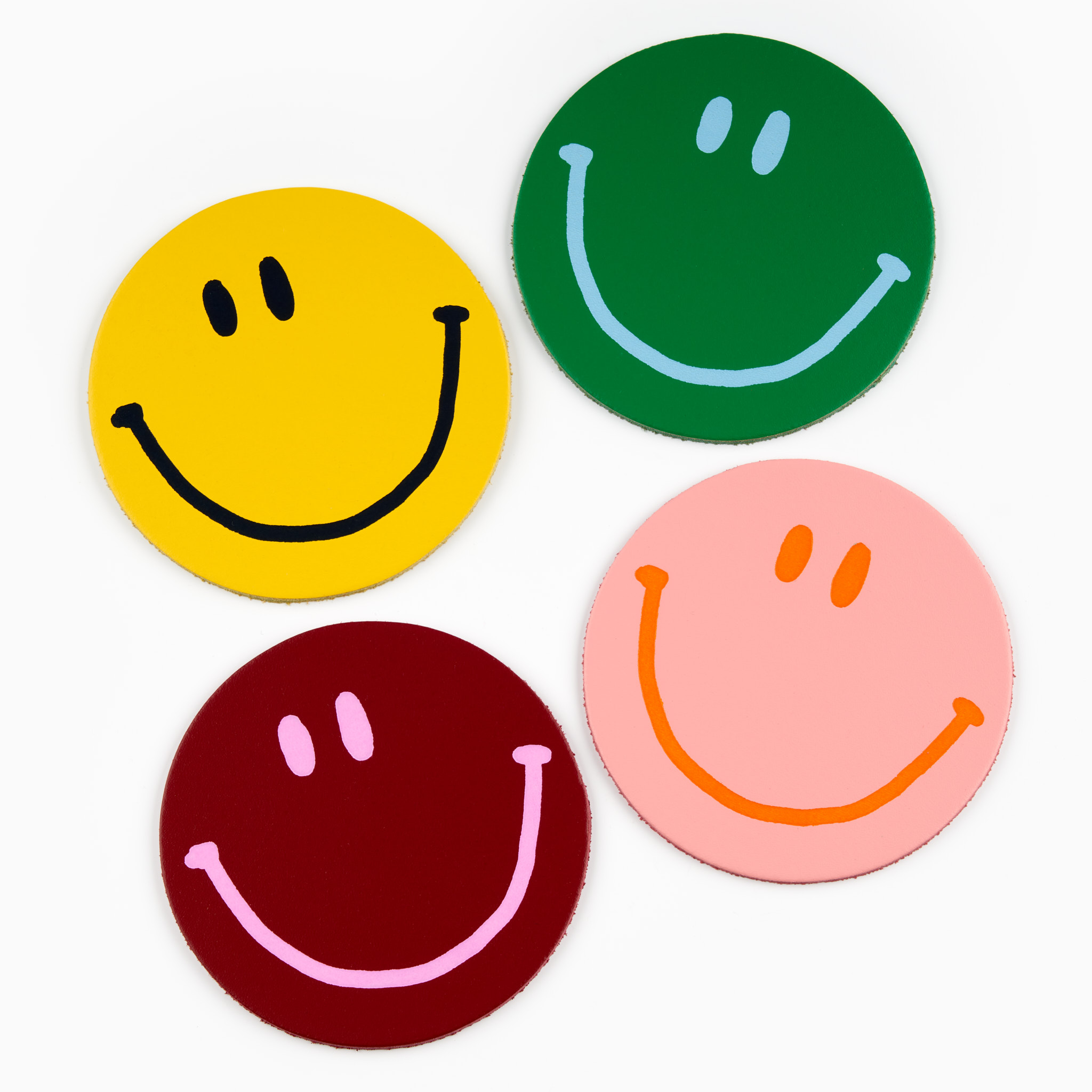 Colourful smiley face coasters.
