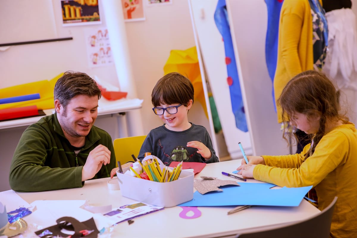 A family doing art & crafts in the Learning Suites of V&A Dundee